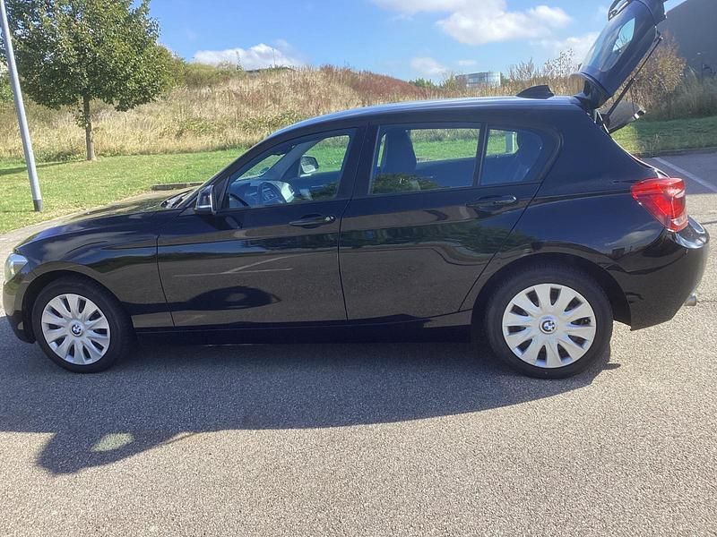 Schwarz Gebraucht 2014 BMW 118 Basis Kleinwagen | 8.000 € (Fairer Preis) - Bild 1/4