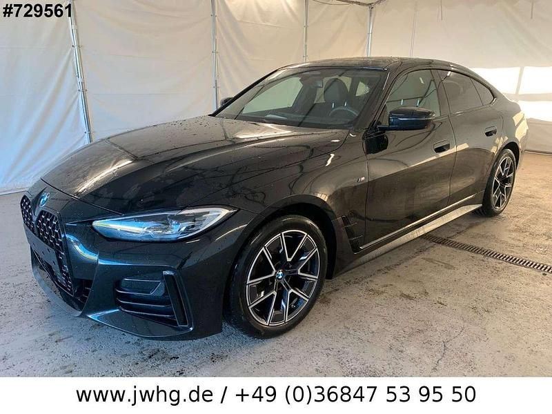 Black sapphire metallic Gebraucht 2023 BMW 420 M Sport Coupé | 39.950 € (Guter Preis) - Bild 1/4