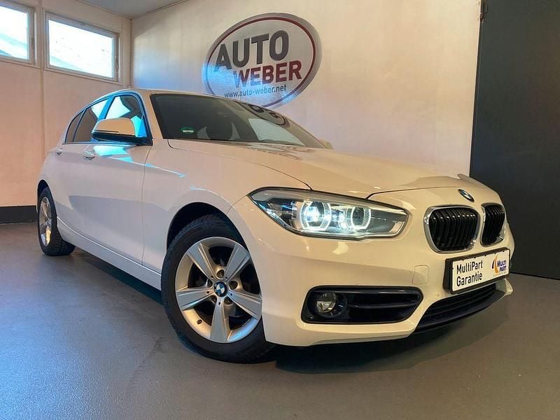Weiß Gebraucht 2018 BMW 118 Sport Line Kleinwagen | 14.999 € (Fairer Preis) - Bild 1/4