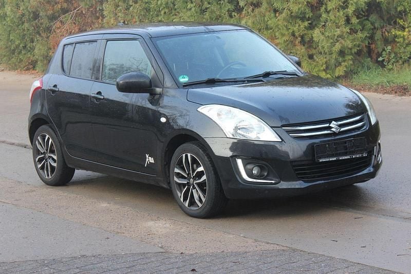 Schwarz Gebraucht 2015 Suzuki Swift X-TRA Limousine | 3.900 € (Superpreis) - Bild 1/4