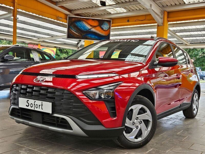 Dragon red / met Gebraucht 2024 Hyundai Bayon Comfort SUV | 19.990 € (Fairer Preis) - Bild 1/4
