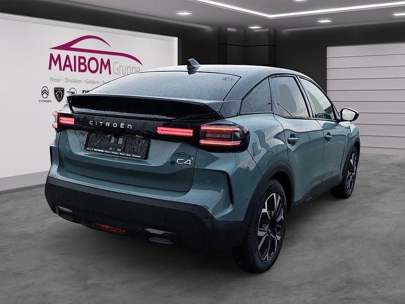 Gebraucht Citroën e-C4 114 kW (156 PS) 2025 Lackierung manhattan green/typ Limousine