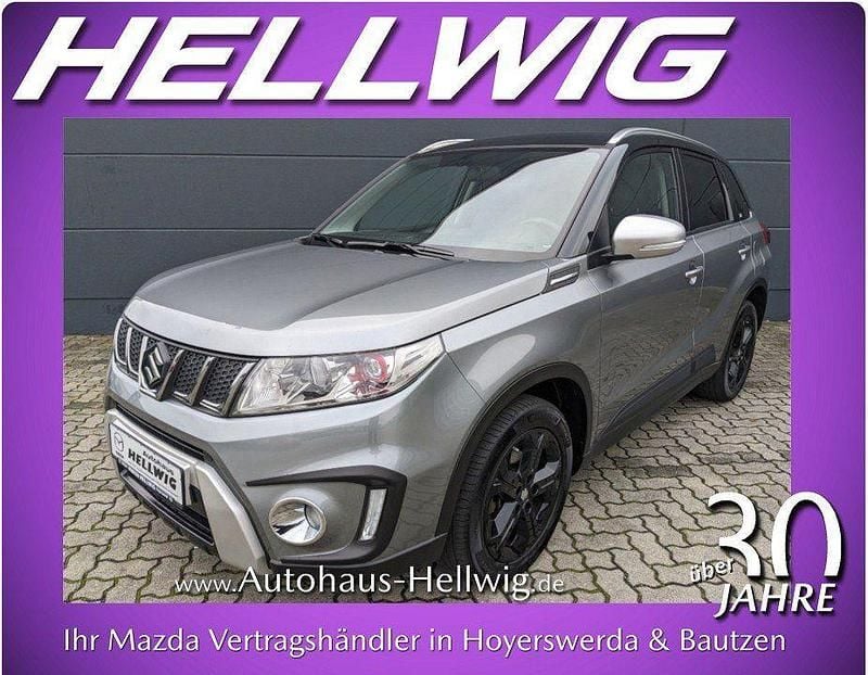 Grau metallic (metallic) Gebraucht 2016 Suzuki Vitara SUV | 15.580 € (Guter Preis) - Bild 1/4