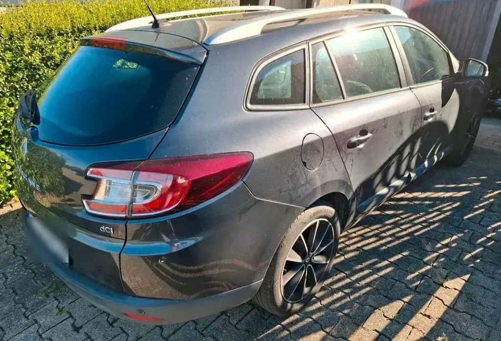 Używany Renault Mégane Initiale Paris 110 KM (80 kW) 2013 Czarny Sedan/Limuzyna