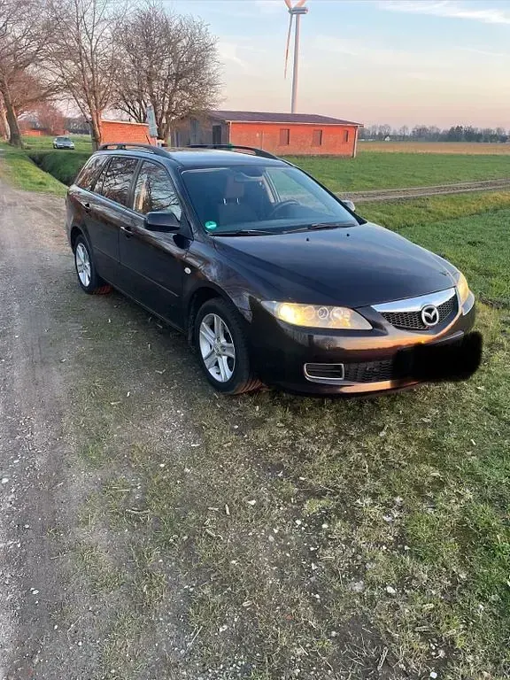 Używany Mazda 6 Exclusive 120 KM (88 kW) 2006 Purpurowy Kombi