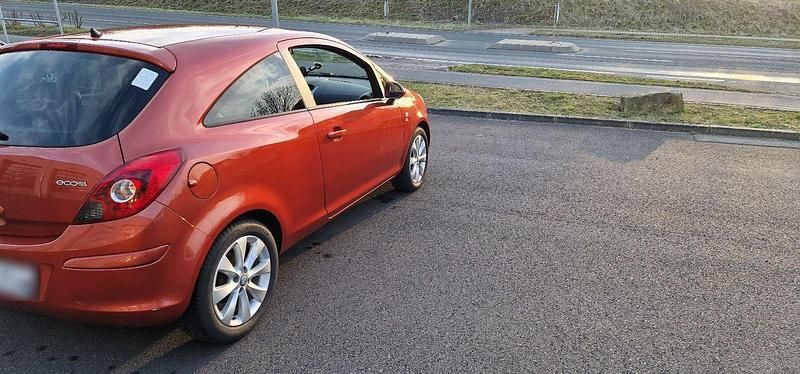Gebraucht Opel Corsa Edition 69 PS (50 kW) 2011 Rot Kleinwagen