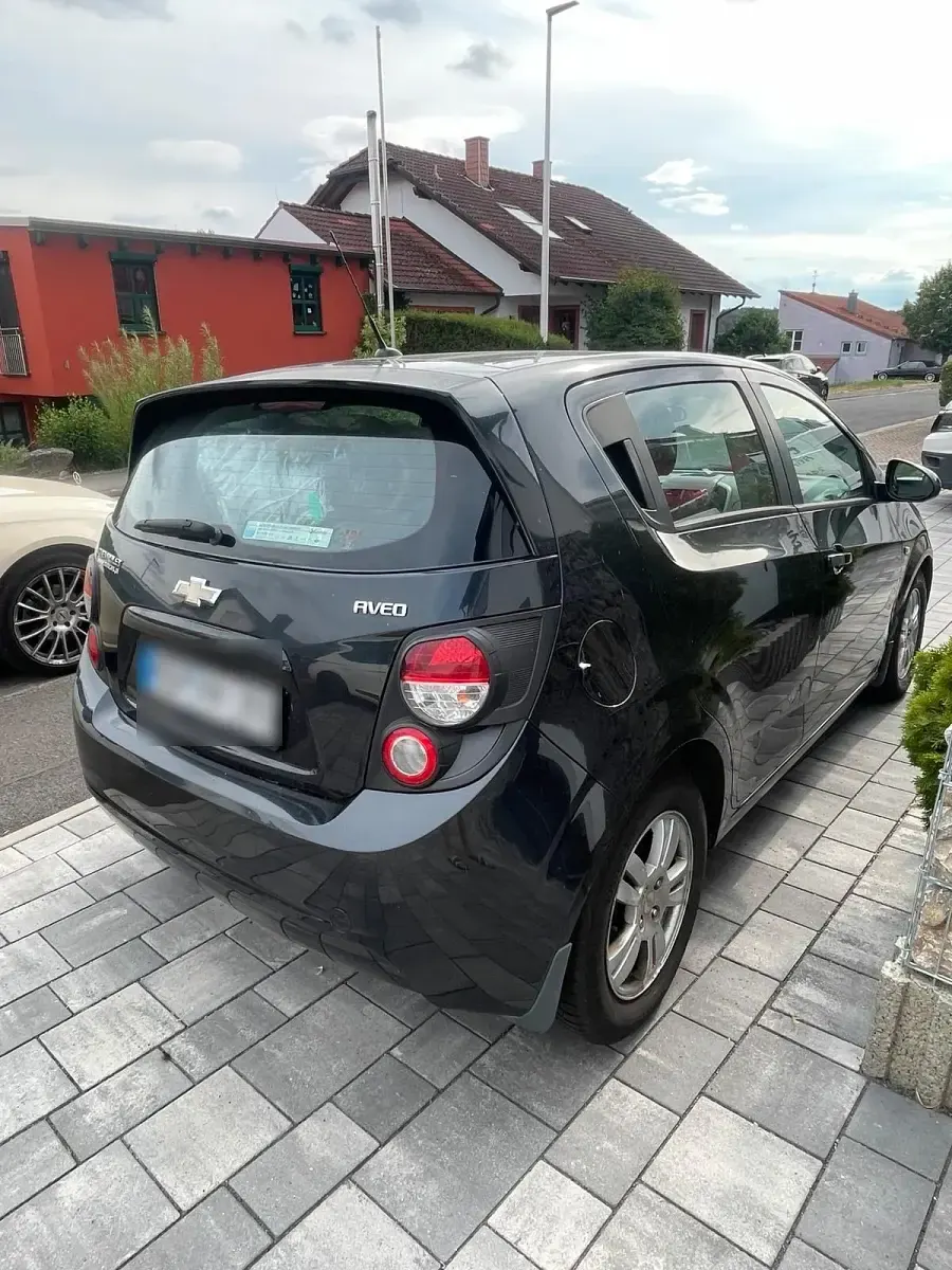 Gebraucht Chevrolet Aveo 86 PS (63 kW) 2012 Schwarz Kleinwagen