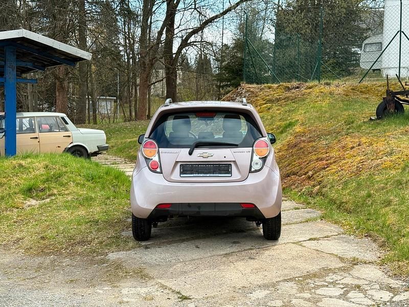 Second-hand Chevrolet Spark 82 CP (60 kW) 2012 Roșu Hatchback