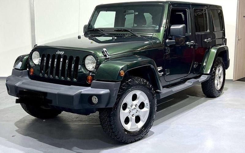 Grün Gebraucht 2012 Jeep Wrangler Unlimited Sahara SUV | 21.500 € (Superpreis) - Bild 1/4