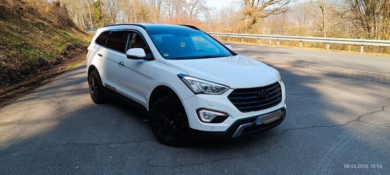 Weiß Gebraucht 2014 Hyundai Grand Santa Fe Premium SUV | 15.498 € - Bild 1/4
