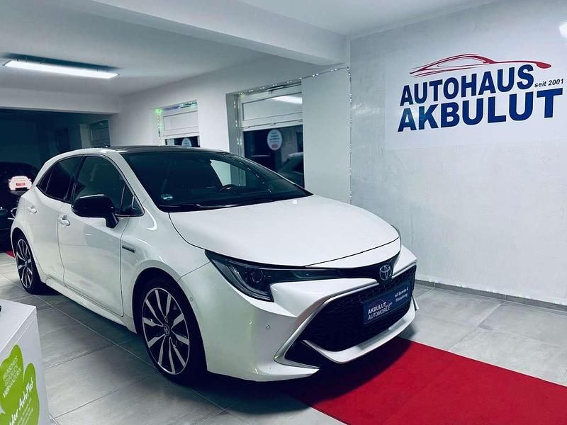 Weiß Gebraucht 2019 Toyota Corolla Hybrid Lounge Kleinwagen | 15.950 € (Fairer Preis) - Bild 1/4