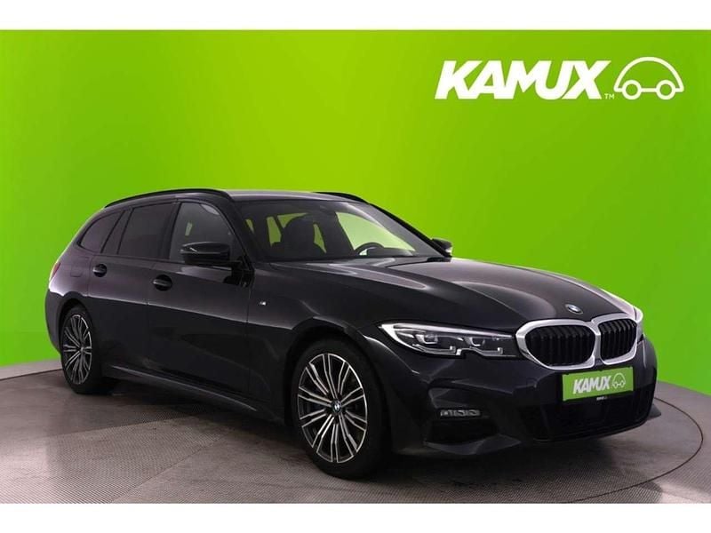 Black sapphire metallic Gebraucht 2020 BMW 330 M Sport Kombi | 32.250 € (Guter Preis) - Bild 1/3