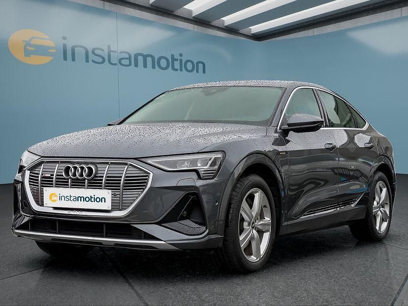 Grau Gebraucht 2021 Audi e-tron S-Line SUV | 26.249 € (Superpreis) - Bild 1/4