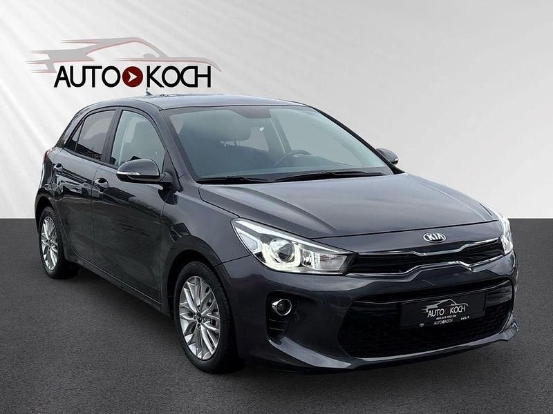 Grau Gebraucht 2019 Kia Rio DREAM-TEAM Edition Limousine | 12.890 € (Guter Preis) - Bild 1/4