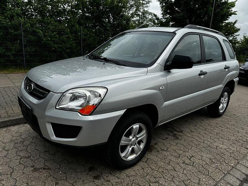 Silber Gebraucht 2009 Kia Sportage Attract SUV | 5.999 € (Fairer Preis) - Bild 1/4