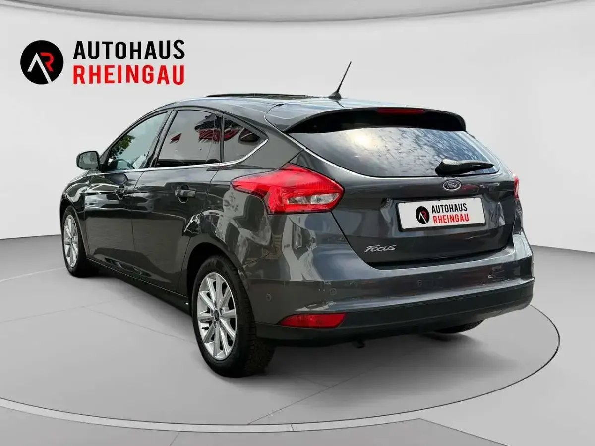 Gebraucht Ford Focus Titanium 125 PS (91 kW) 2018 Magneticgrau (metallic) Limousine