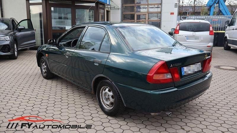 Second-hand Mitsubishi Lancer 75 CP (55 kW) 1998 Verde Berlinǎ