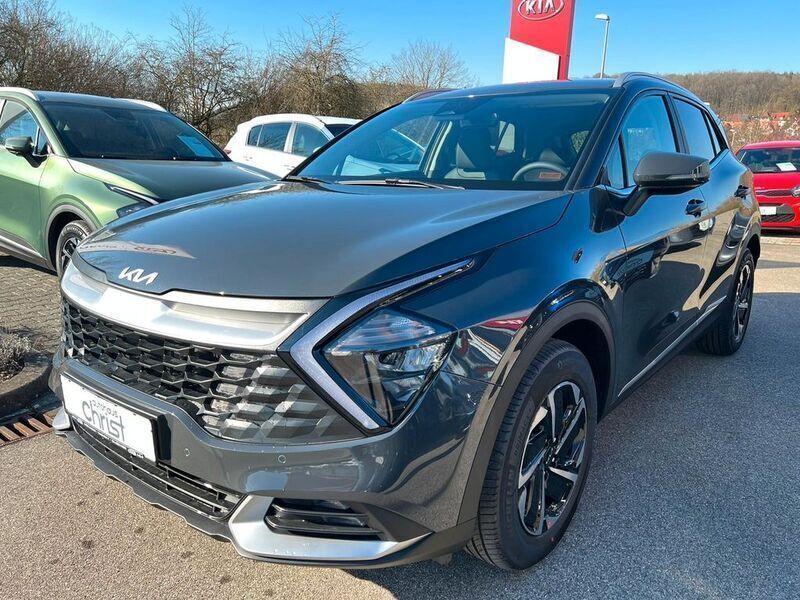 Grau Gebraucht 2023 Kia Sportage Comfort SUV | 32.490 € (Superpreis) - Bild 1/4