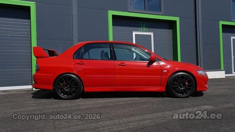 Second-hand Mitsubishi Lancer 265 CP (194 kW) 2004 Roșu Berlinǎ
