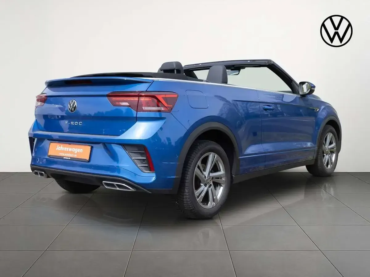 Gebraucht VW T-Roc R-line 150 PS (110 kW) 2023 Ravennablau metallic/schwarz SUV
