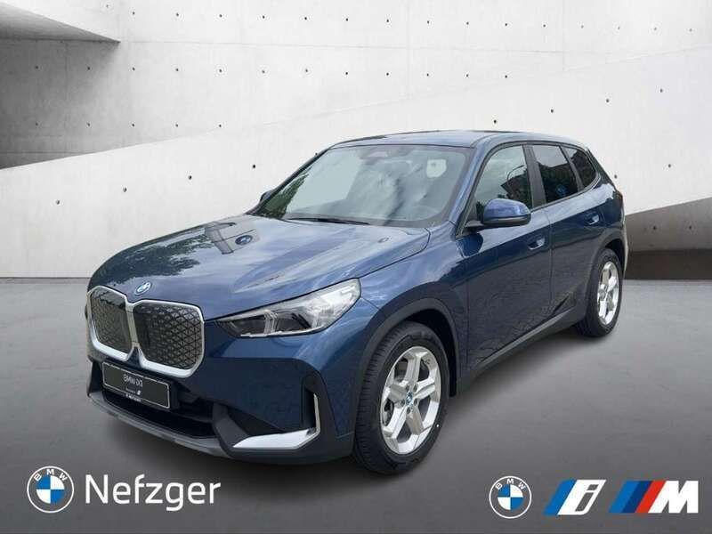 Blau Gebraucht 2024 BMW iX1 Performance SUV | 49.089 € (Teuer) - Bild 1/4