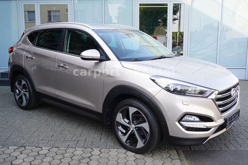 Grau Gebraucht 2015 Hyundai Tucson Premium SUV | 19.999 € (Fairer Preis) - Bild 1/3