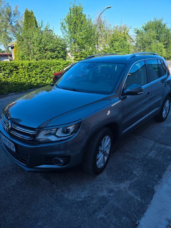Grau Gebraucht 2014 VW Tiguan Sportline SUV | 12.000 € (Superpreis) - Bild 1/4