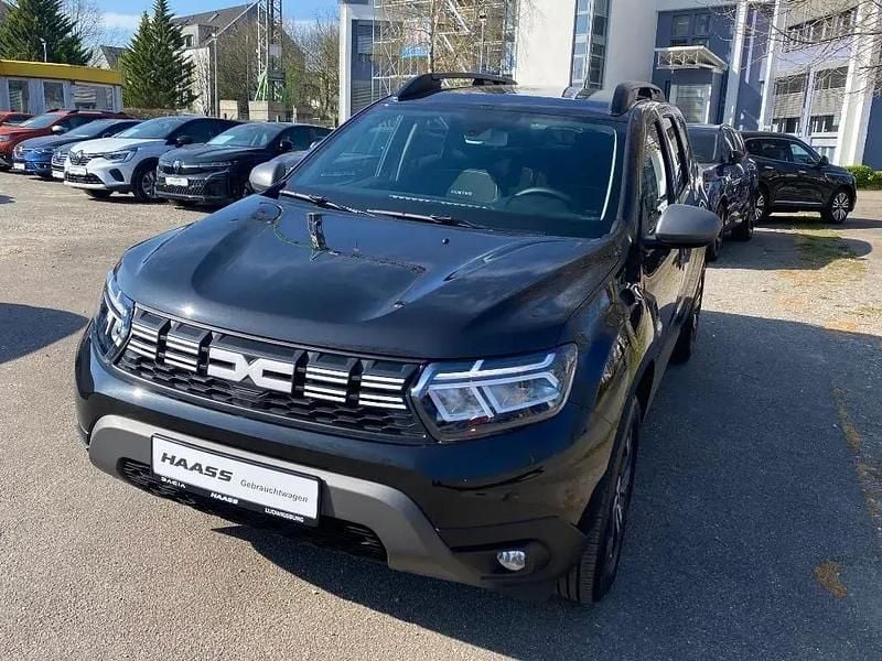 Perlmuttschwarz metallic Gebraucht 2024 Dacia Duster Journey SUV | 24.900 € (Fairer Preis) - Bild 1/4