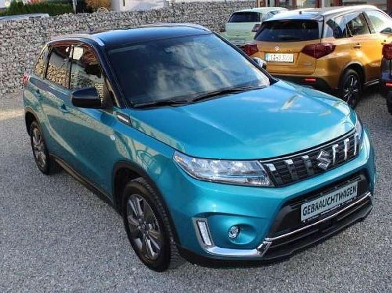 Gebraucht Suzuki Vitara Comfort 116 PS (85 kW) 2022 Atlantis turquoise/cosmic blac SUV
