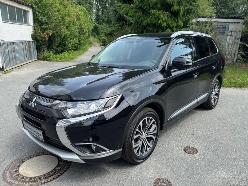 Pantherschwarz Gebraucht 2016 Mitsubishi Outlander Top SUV | 15.900 € (Fairer Preis) - Bild 1/4