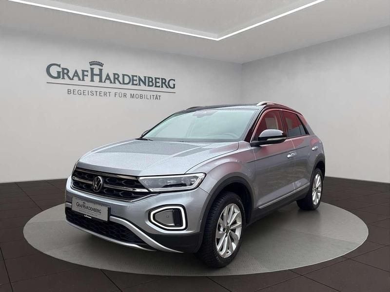Pyritsilber metallic Gebraucht 2024 VW T-Roc Style SUV | 29.444 € (Fairer Preis) - Bild 1/4