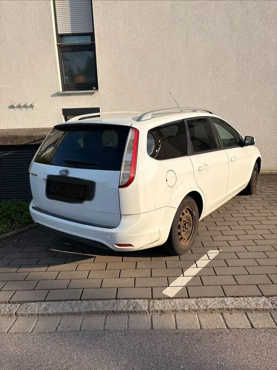 Używany Ford Focus 125 KM (91 kW) 2010 Biały Kombi