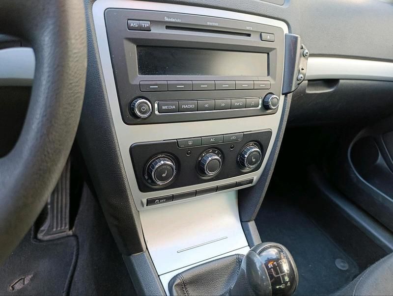 Second-hand Skoda Octavia GreenLine 105 CP (77 kW) 2009 Negru Break