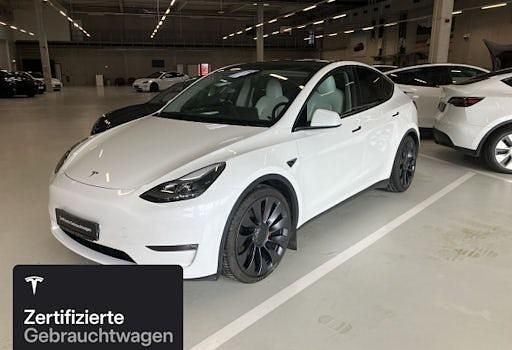 Weiß Gebraucht 2023 Tesla Model Y Performance SUV | 46.400 € (Teuer) - Bild 1/4