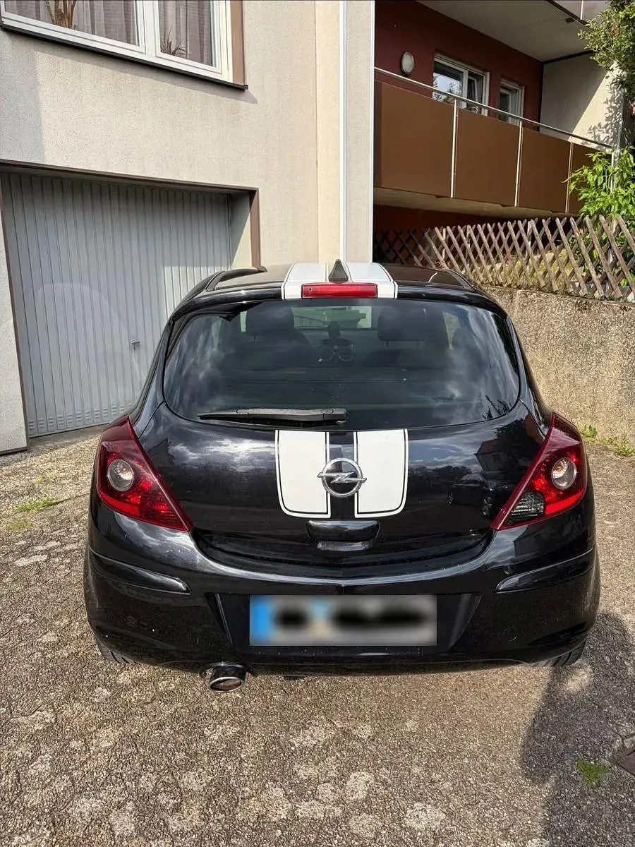 Gebraucht Opel Corsa 87 PS (63 kW) 2011 Schwarz Kleinwagen