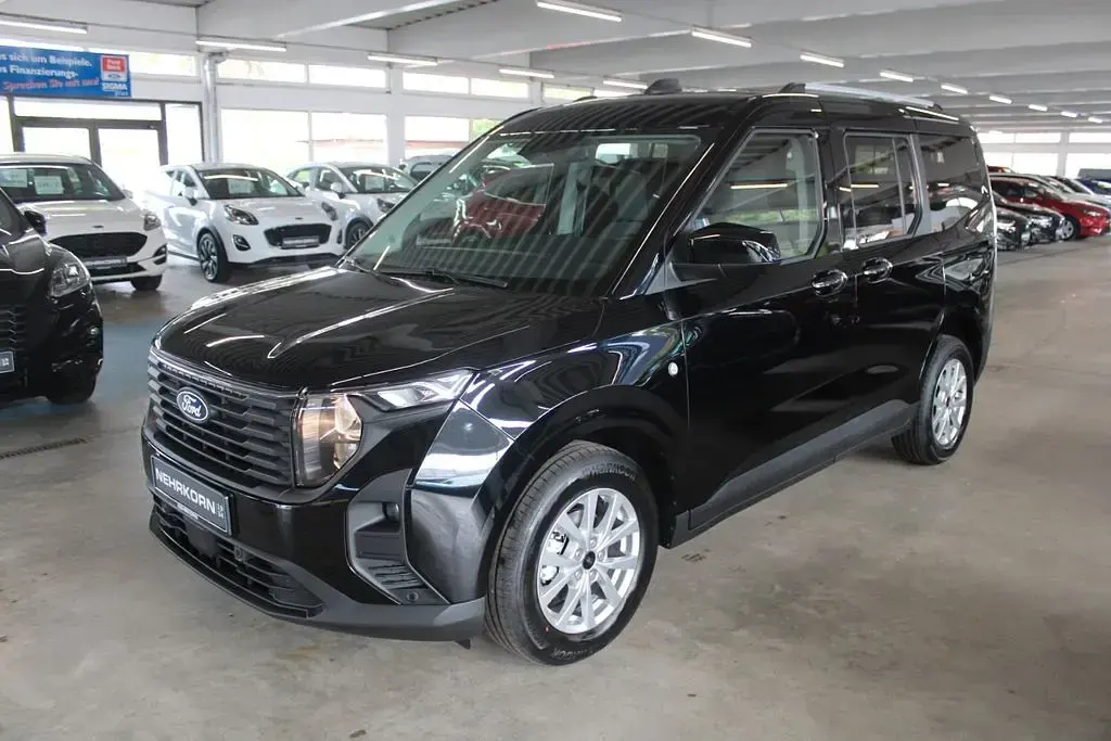 Neu Ford Tourneo Courier Titanium 125 PS (91 kW) 2026 Rot Van / Kleinbus