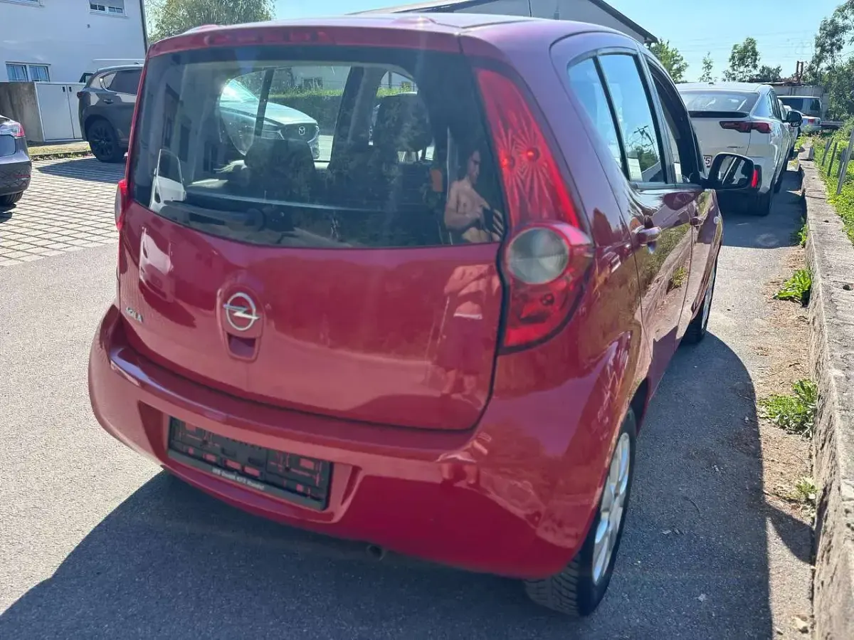 Gebraucht Opel Agila Edition 86 PS (63 kW) 2008 H:glutrot/f:tomatenrot Kleinwagen