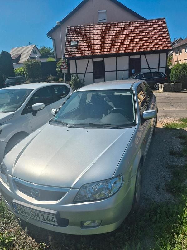 Grau Gebraucht 2001 Mazda 323F Kleinwagen | 1.250 € (Guter Preis) - Bild 1/4