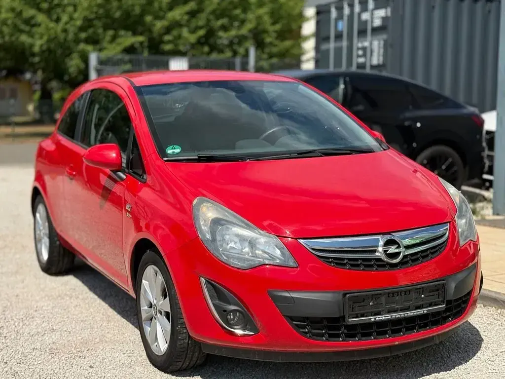 Gebraucht Opel Corsa Active 95 PS (69 kW) 2013 Magmarot/flame red Kleinwagen