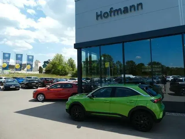 Gebraucht Opel Mokka-e Elegance 100 kW (136 PS) 2024 Grün (matcha green) SUV
