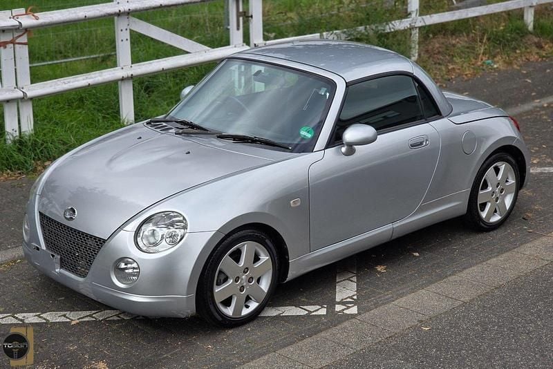 Silber Gebraucht 2004 Daihatsu Copen Cabrio | 4.450 € - Bild 1/3
