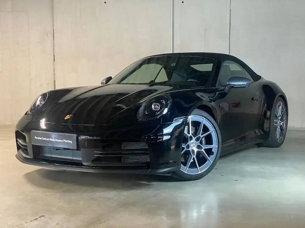 Gebraucht Porsche 992 394 PS (289 kW) 2025 Schwarz (metallic) Cabrio