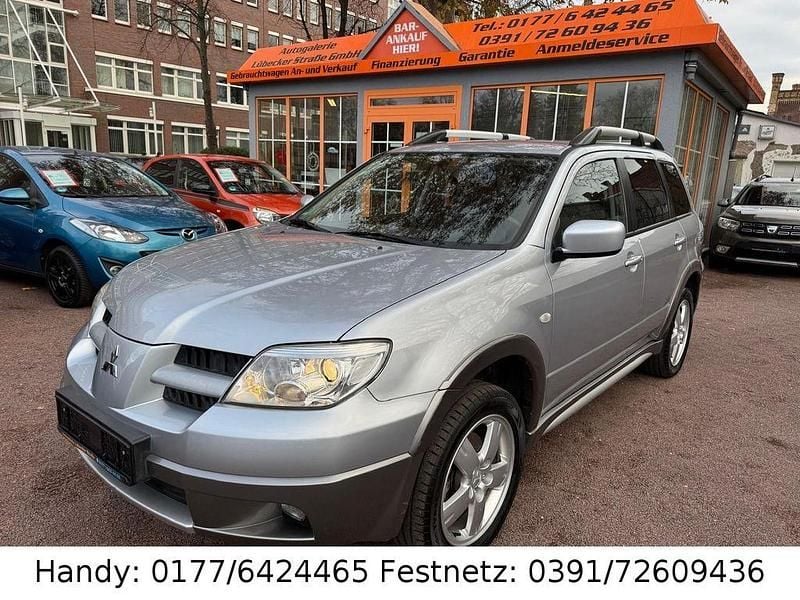 Silber Gebraucht 2009 Mitsubishi Outlander Plus SUV | 6.890 € (Fairer Preis) - Bild 1/4