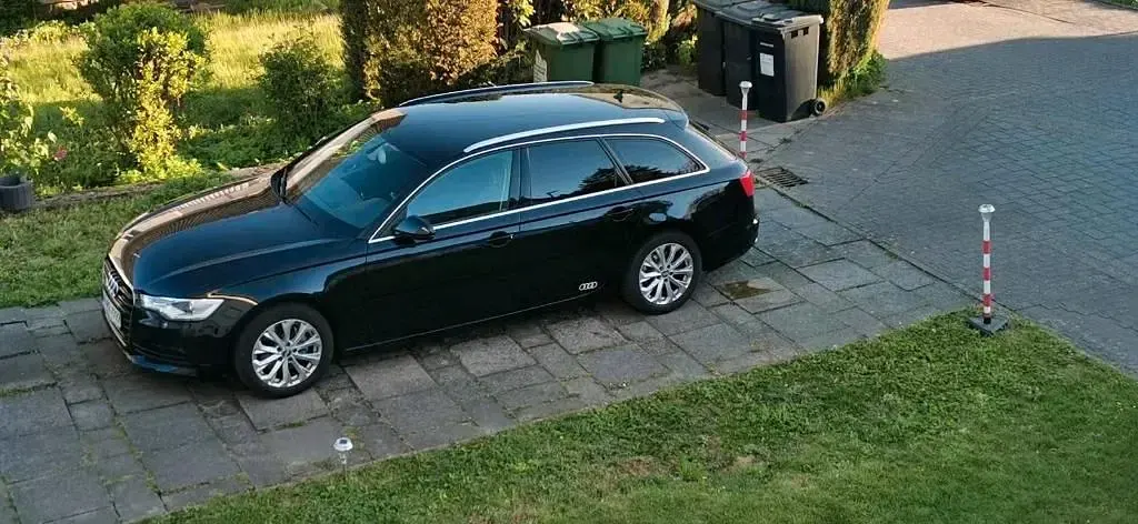 Używany Audi A6 177 KM (130 kW) 2014 Czarny Kombi