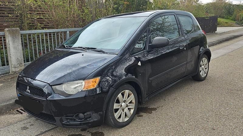 Second-hand Mitsubishi Colt 75 CP (55 kW) 2011 Negru Hatchback
