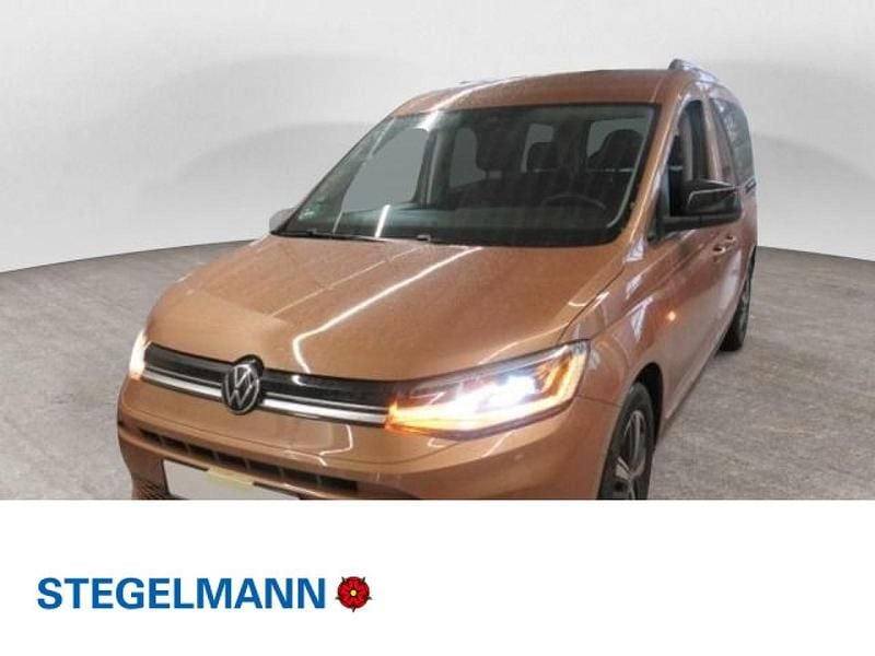 Braun Gebraucht 2023 VW Caddy Maxi Style Van / Kleinbus | 33.490 € (Guter Preis) - Bild 1/4