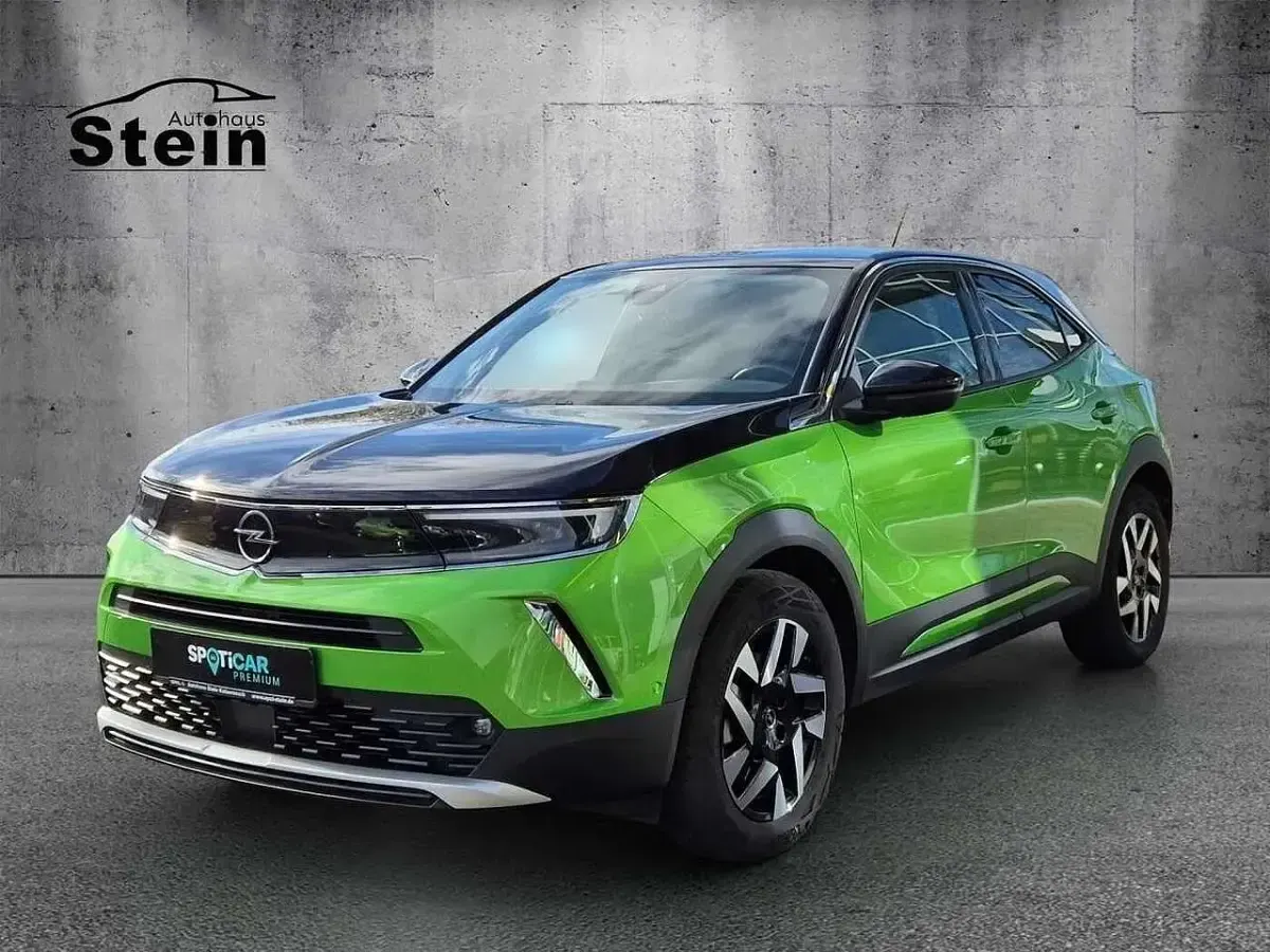 Gebraucht Opel Mokka-e Elegance 100 kW (136 PS) 2022 Matcha green/ikone gruen (metallic) SUV