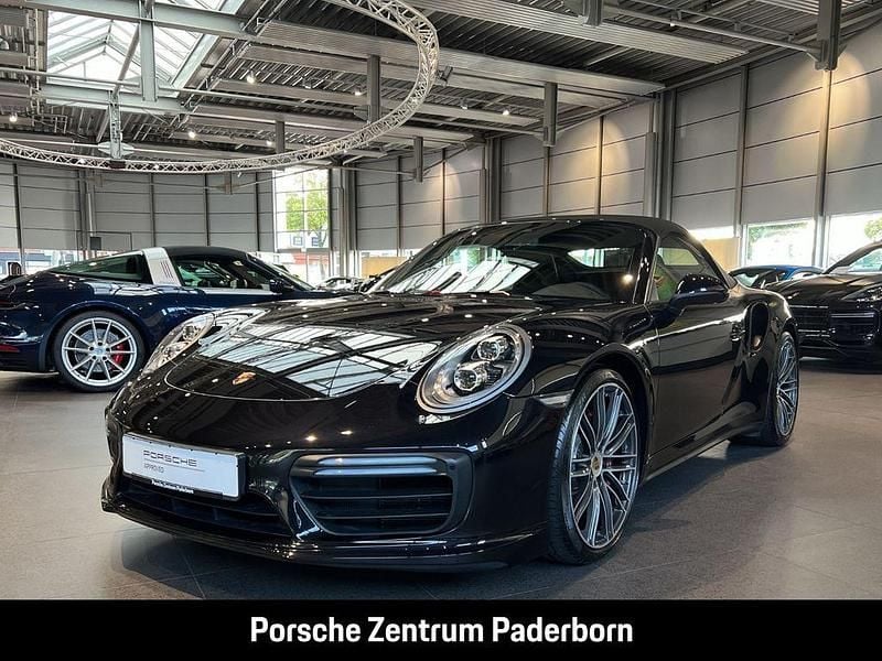 Tiefschwarzmetallic Gebraucht 2017 Porsche 911 Turbo Cabriolet Cabrio | 141.890 € (Fairer Preis) - Bild 1/4
