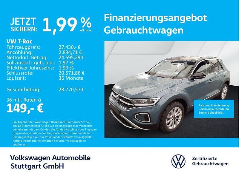 Petroleum blue metallic/schwar Gebraucht 2024 VW T-Roc Style SUV | 27.430 € (Superpreis) - Bild 1/4