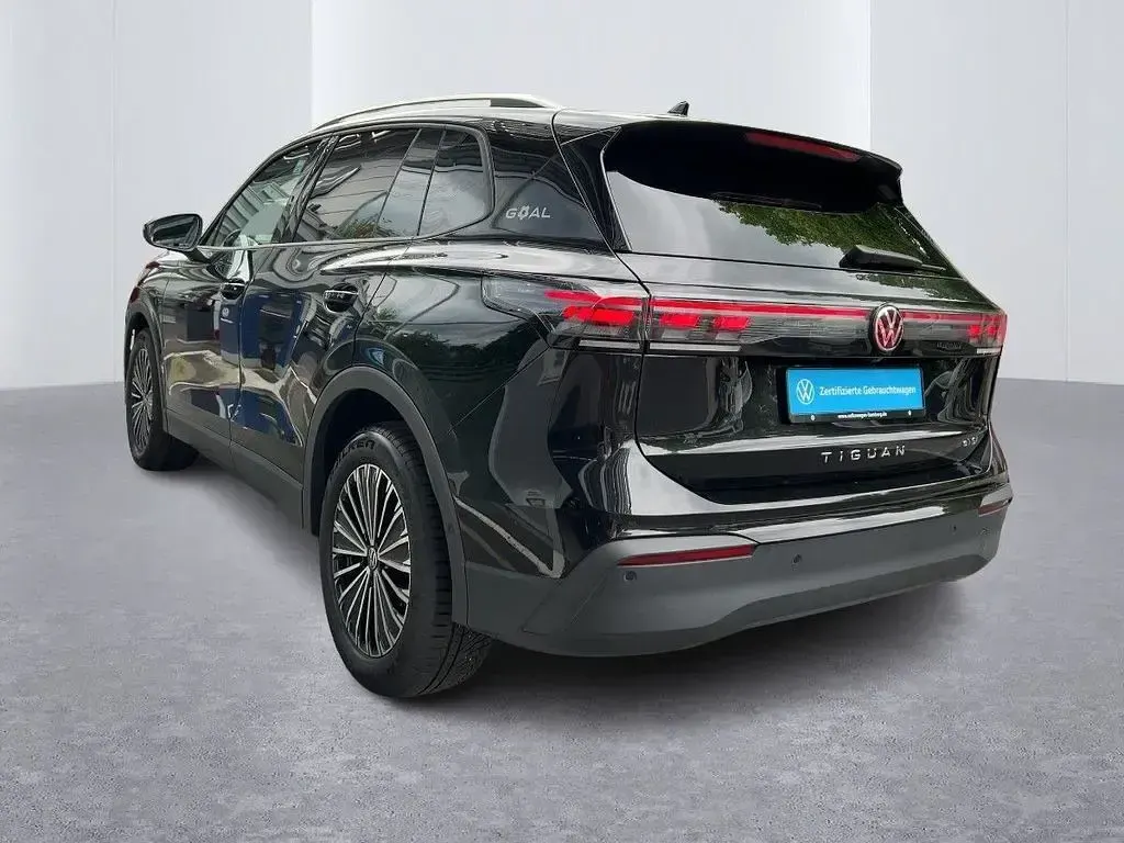 Gebraucht VW Tiguan Goal 131 PS (96 kW) 2025 0e grenadillschwarz metallic SUV